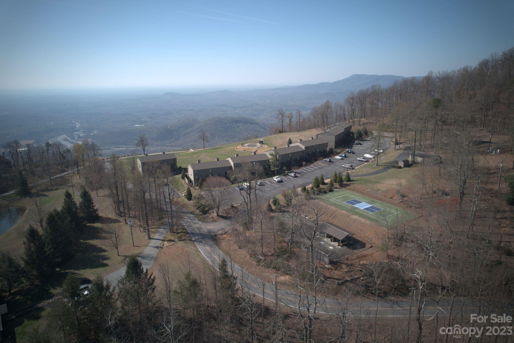 2881 White Oak Mountain Road, Unit D2 Columbus, NC 28722 - Photo 14 of 39 a view of a city with lots of trees