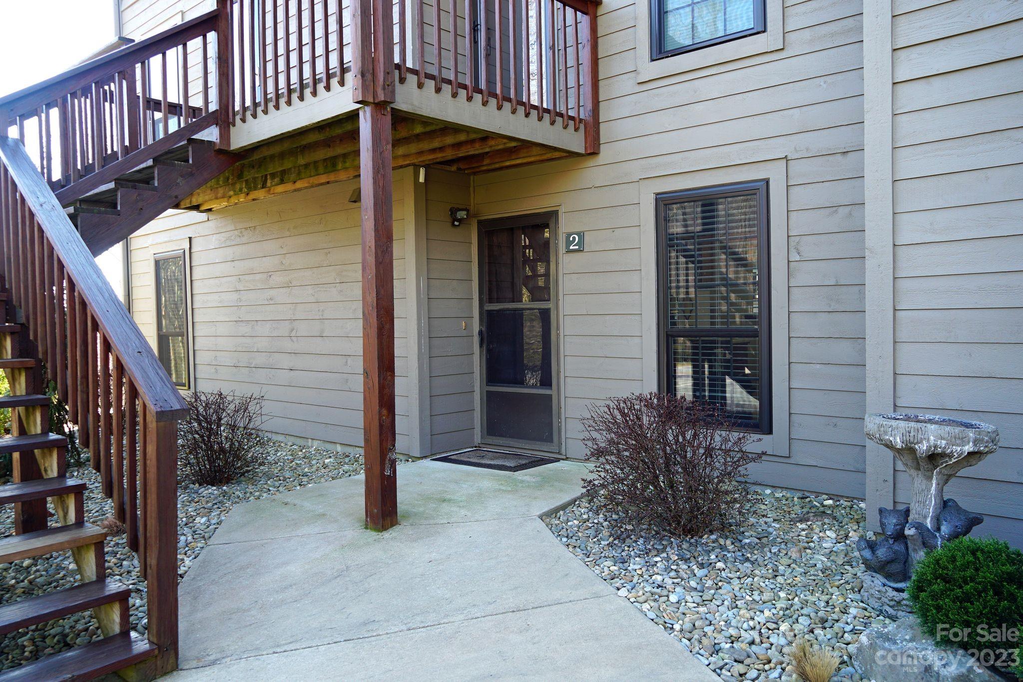 2881 White Oak Mountain Road, Unit D2 Columbus, NC 28722 - Photo 16 of 39 a view of a house with wooden fence