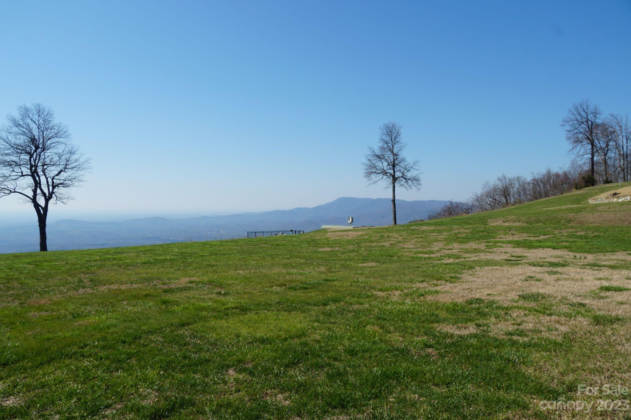 2881 White Oak Mountain Road, Unit D2 Columbus, NC 28722 - Photo 9 of 39 a house view with a outdoor space