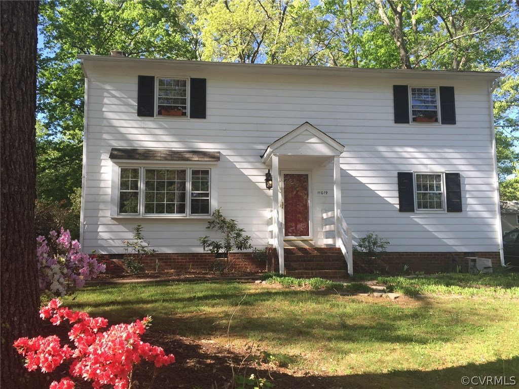 11019 Rockledge Road Richmond, VA 23235 - Photo 1 of 36 a front view of house with yard