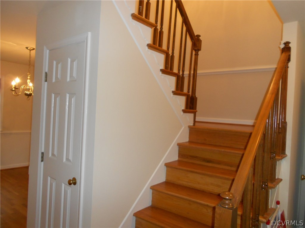 11019 Rockledge Road Richmond, VA 23235 - Photo 19 of 36 a view of entryway with wooden floor