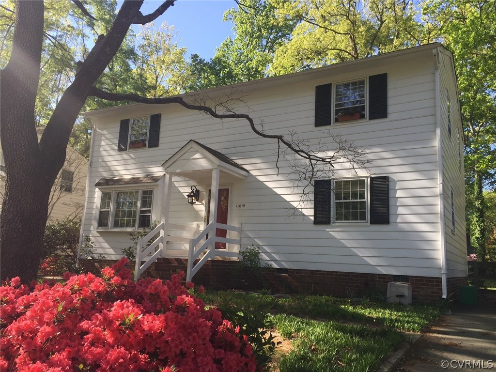 11019 Rockledge Road Richmond, VA 23235 - Photo 2 of 36 a front view of a house with a yard