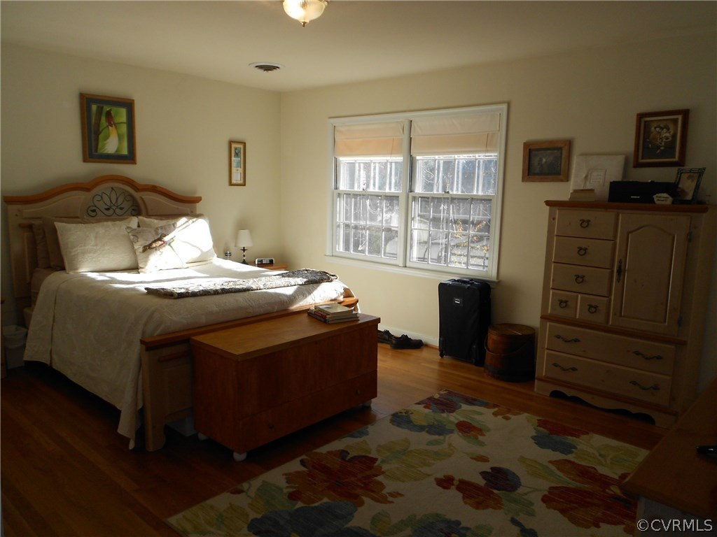 11019 Rockledge Road Richmond, VA 23235 - Photo 25 of 36 a bedroom with a bed and a window
