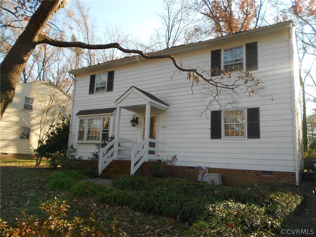 11019 Rockledge Road Richmond, VA 23235 - Photo 3 of 36 a view of a house with a yard