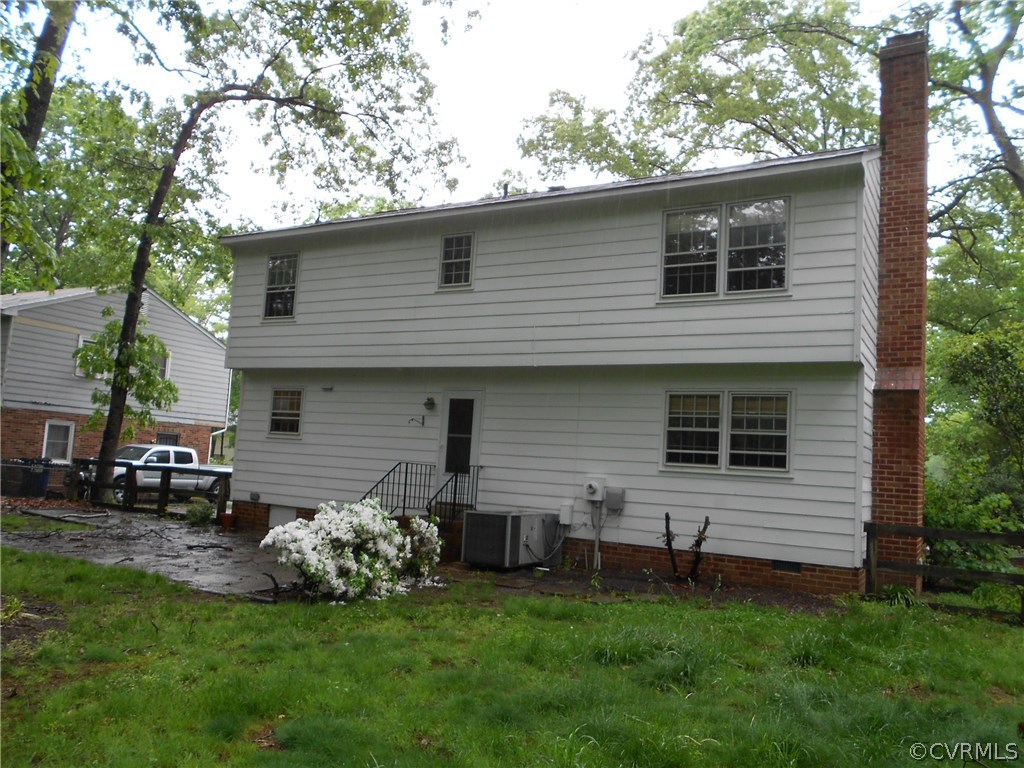 11019 Rockledge Road Richmond, VA 23235 - Photo 35 of 36 a front view of a house with a garden