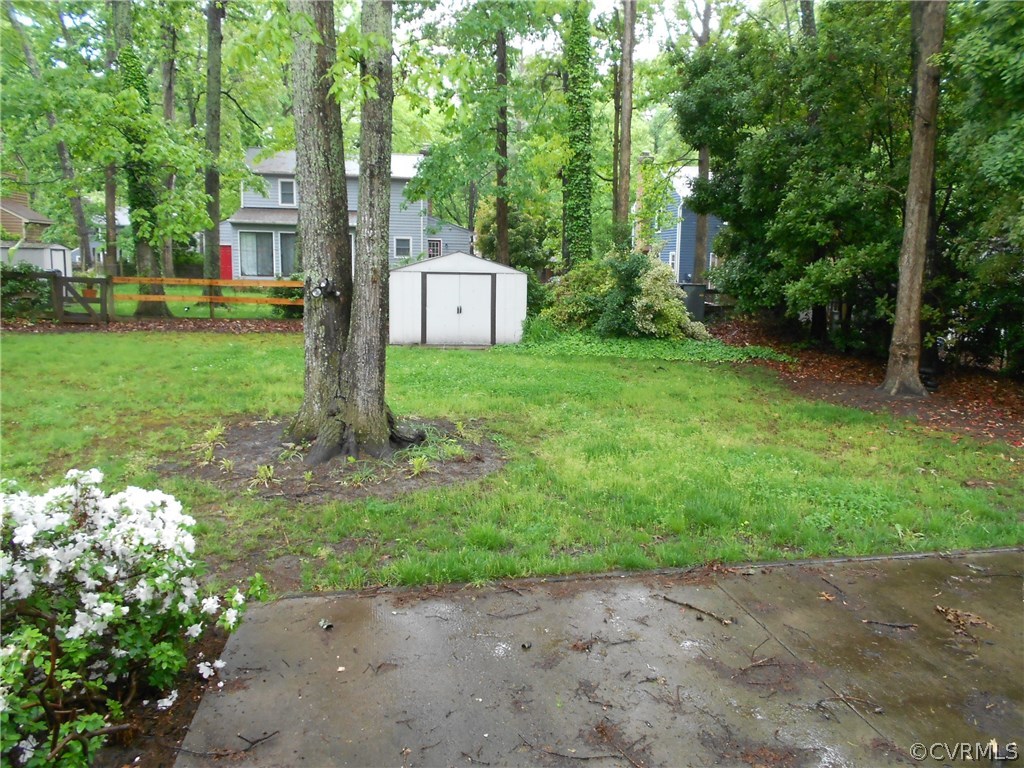 11019 Rockledge Road Richmond, VA 23235 - Photo 36 of 36 a backyard of a house with seating and garden