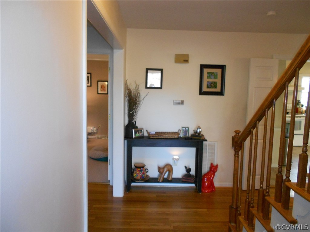11019 Rockledge Road Richmond, VA 23235 - Photo 5 of 36 a view of living room with furniture and wooden floor