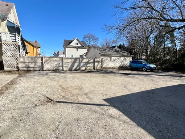 a view of a house with a snow in the yard