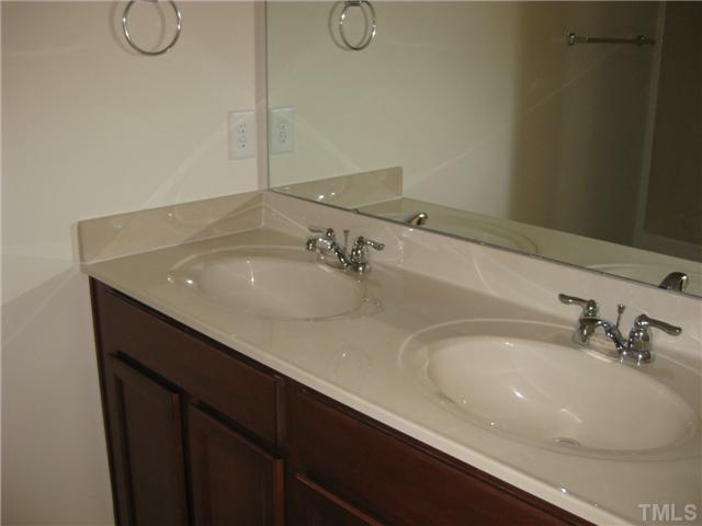 1648 Holly Grove Way Durham, NC 27713 - Photo 6 of 7 Raised vanities and beautiful cabinetry in the master bathroom - and you don't have to share a sink!