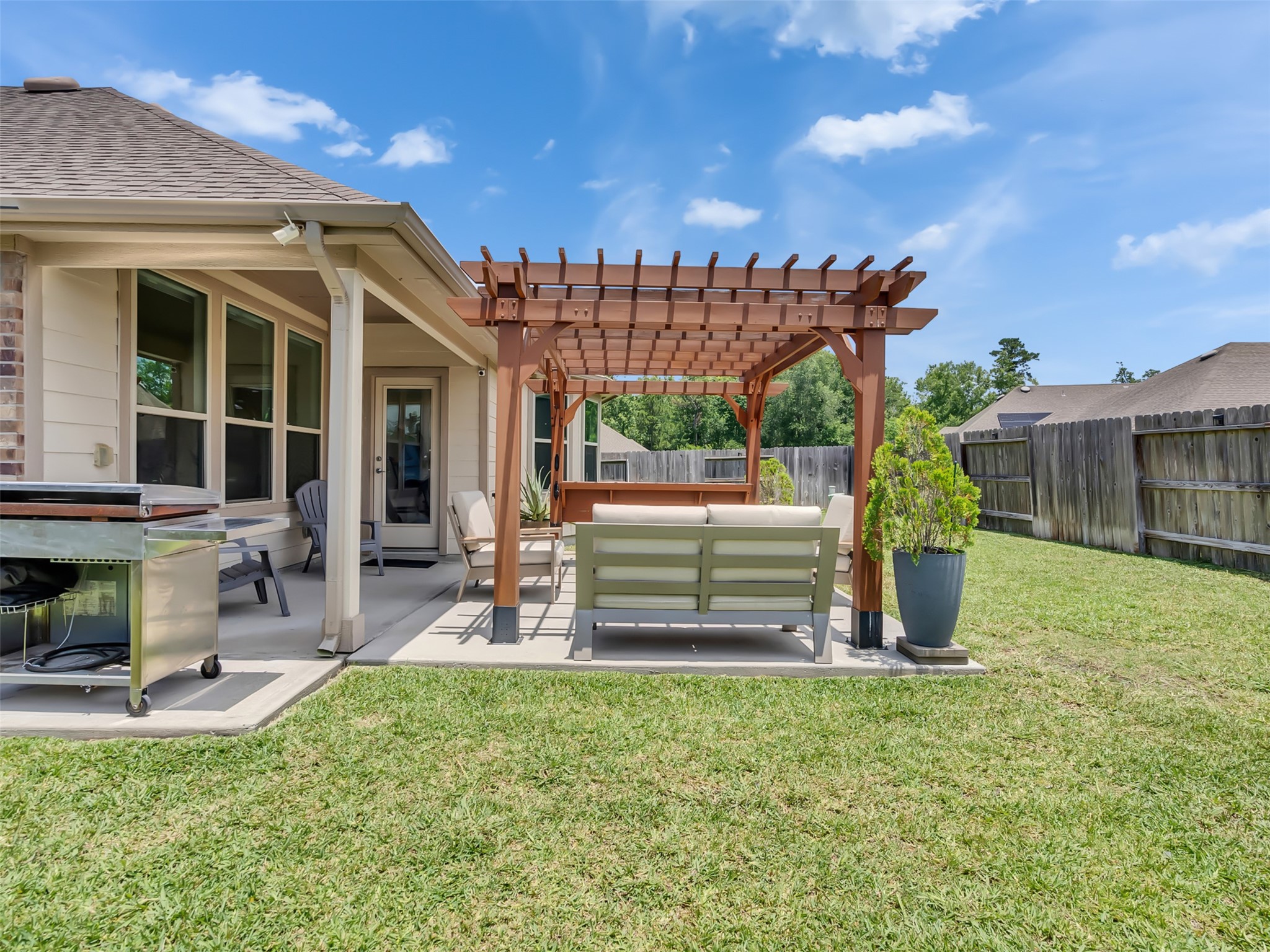 27997 Lone Hollow Lane Spring, TX 77386 - Photo 10 of 45 a view of a house with backyard and porch