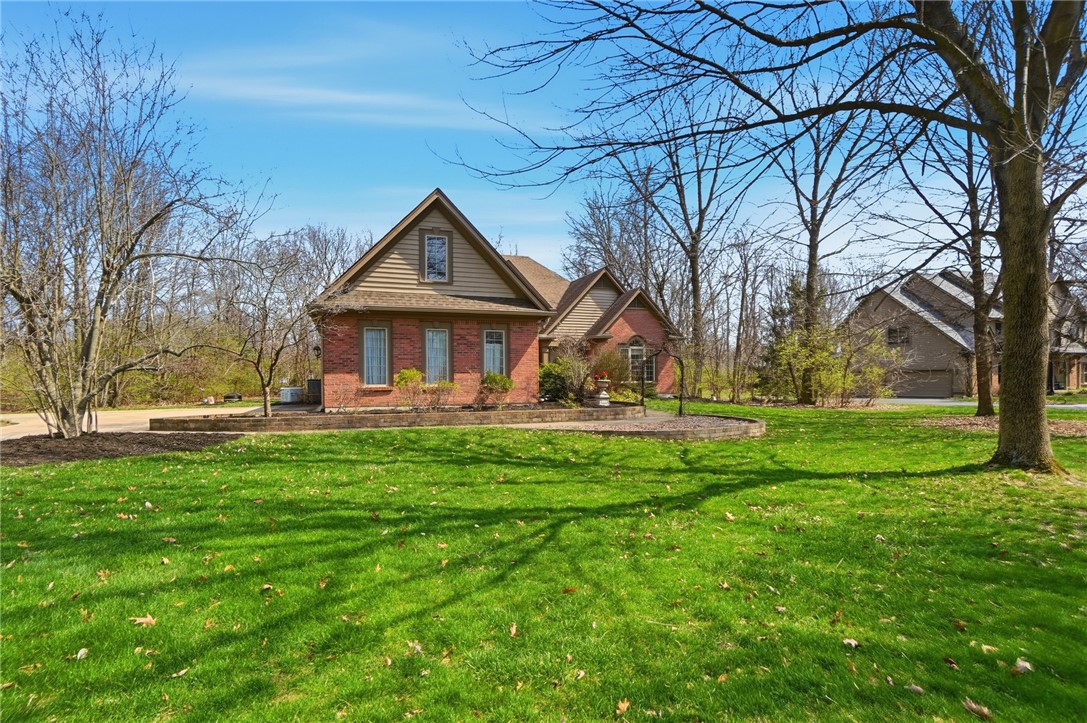 472 Timber Walk Court Springboro, OH 45066 - Photo 58 of 86 This charming home features classic brick and shingle siding, nestled within a lush, expansive yard.