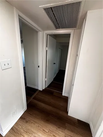 an entryway with a rug