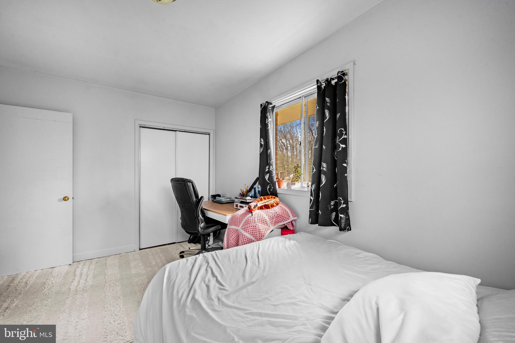 1303 Jefferson Road Fort Washington, MD 20744 - Photo 16 of 29 a bedroom with a bed and a bookshelf