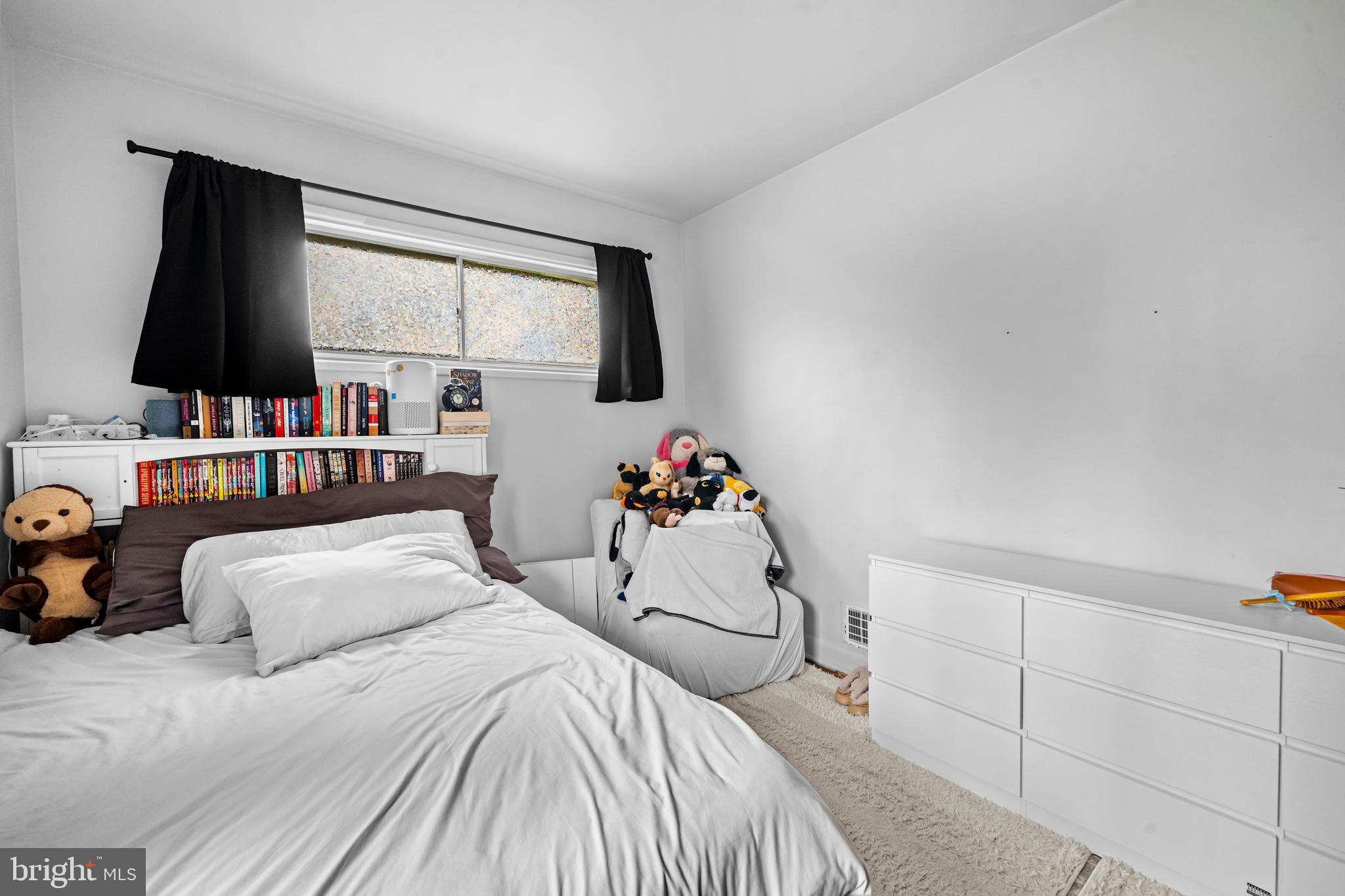 1303 Jefferson Road Fort Washington, MD 20744 - Photo 17 of 29 a bedroom with a bed and a flat screen tv