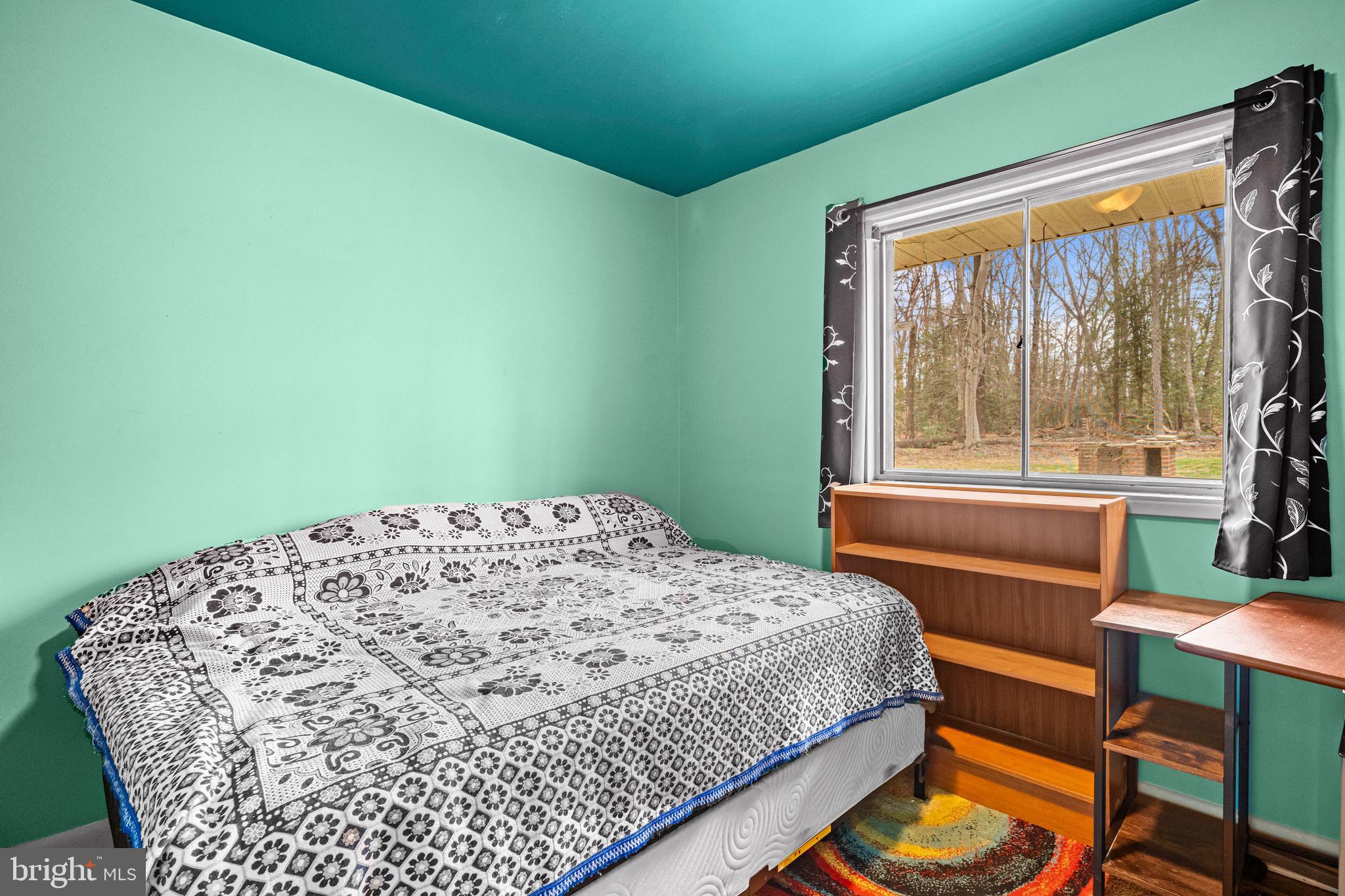 1303 Jefferson Road Fort Washington, MD 20744 - Photo 20 of 29 a bedroom with a bed and a chair