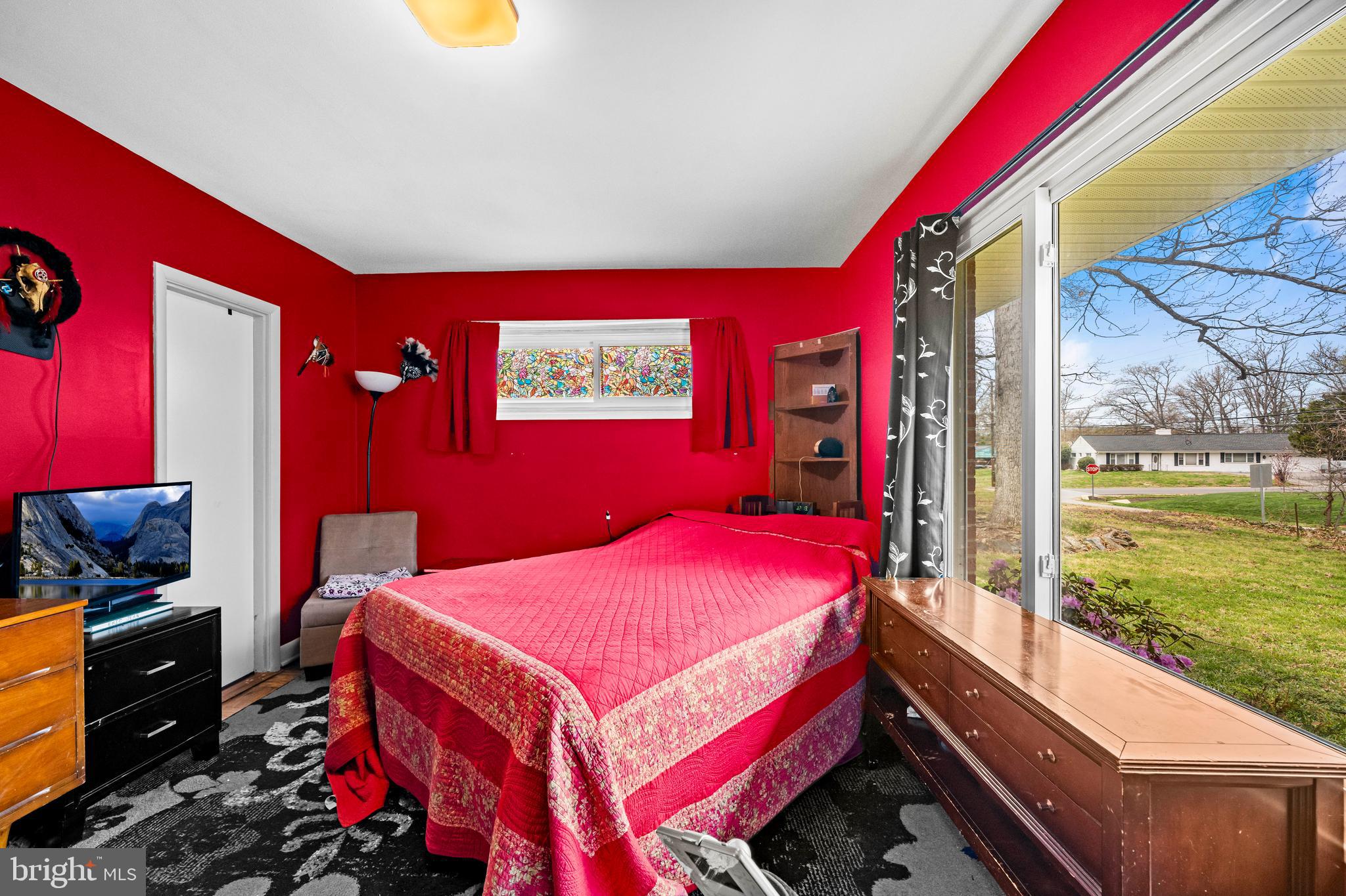 1303 Jefferson Road Fort Washington, MD 20744 - Photo 22 of 29 a bedroom with a bed and a window