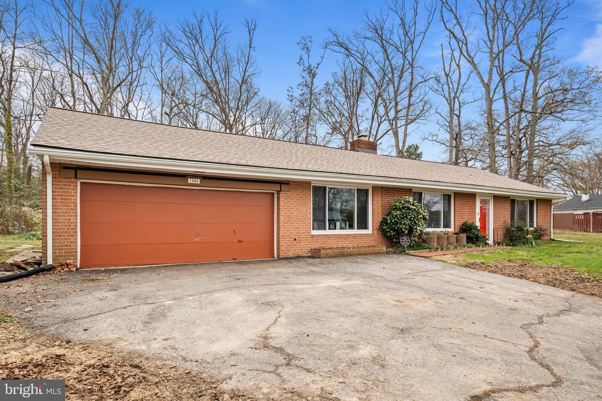 1303 Jefferson Road Fort Washington, MD 20744 - Photo 5 of 29 a front view of house with a yard and garage
