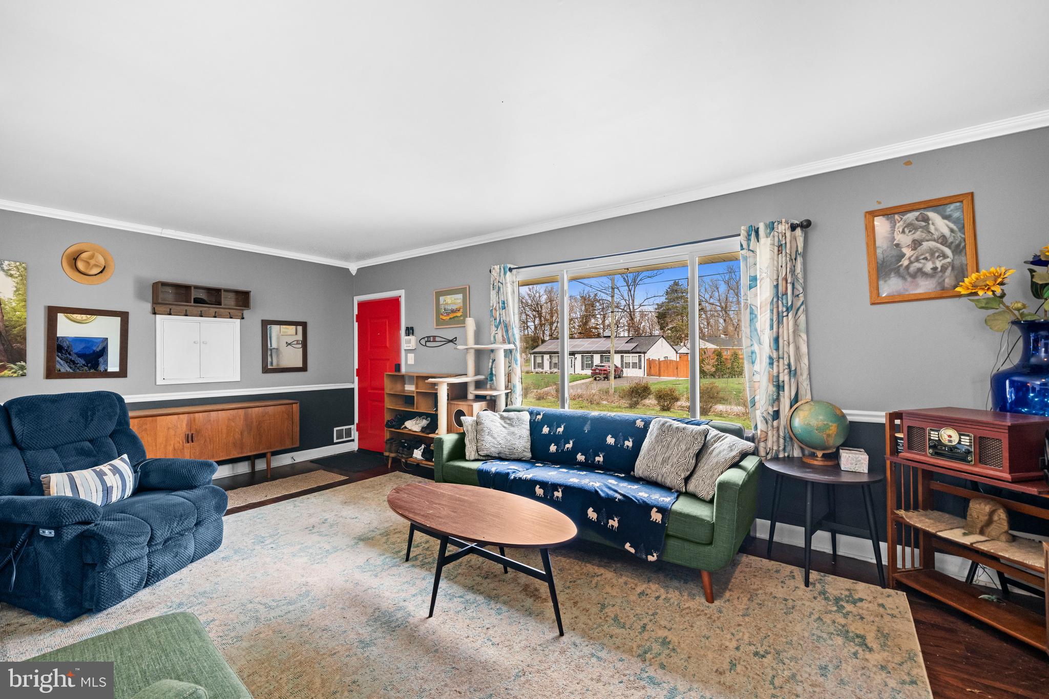 1303 Jefferson Road Fort Washington, MD 20744 - Photo 9 of 29 a living room with furniture a rug and a window