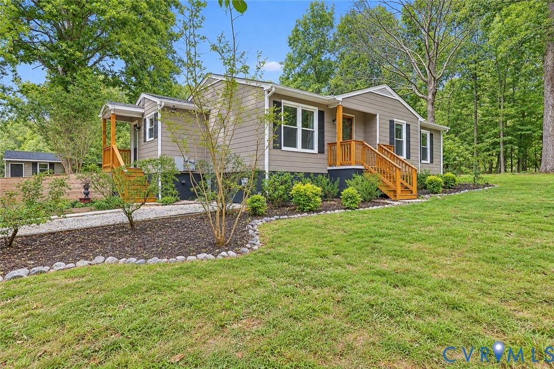 3046 Davis Mill Road Goochland, VA 23063 - Photo 4 of 40 Neutral-toned siding exterior with dark shutters,