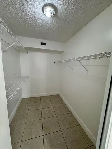 a view of a storage and utility room