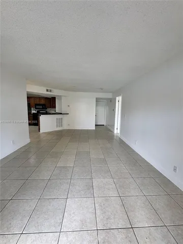 a view of a livingroom with furniture