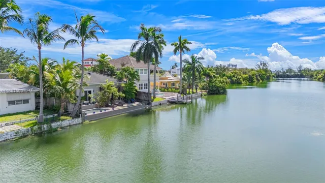 a view of a lake with a building in the background