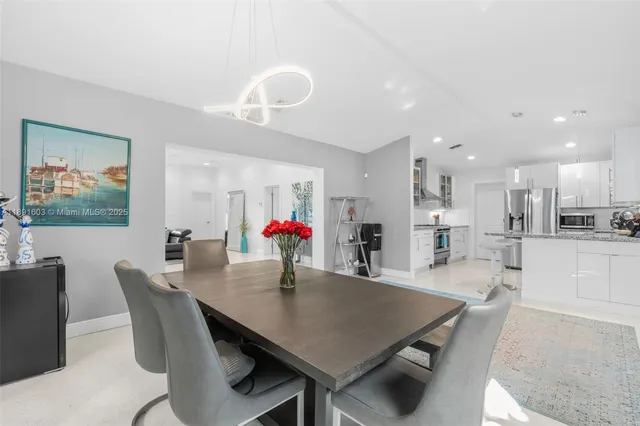 a view of a dining room and livingroom