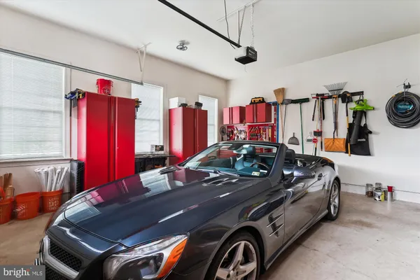 a room with furniture and pool table