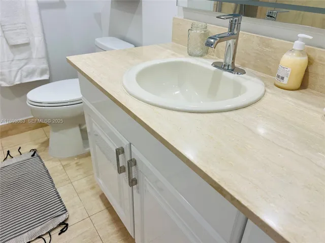 a bathroom with a shower and toilet