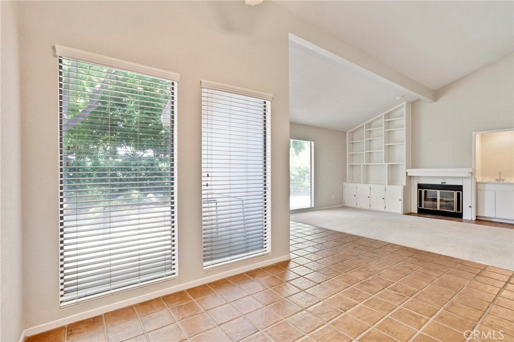 3350 M Street, Unit 24 Merced, CA 95348 - Photo 12 of 38 a view of a livingroom with a window and fire place
