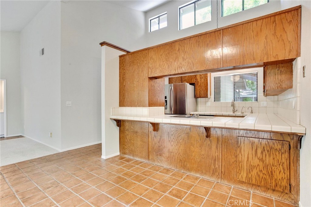3350 M Street, Unit 24 Merced, CA 95348 - Photo 14 of 38 a spacious bathroom with a granite countertop sink and a mirror