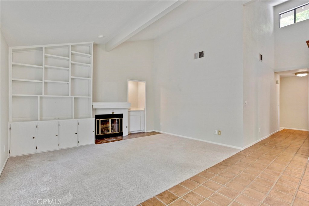 3350 M Street, Unit 24 Merced, CA 95348 - Photo 18 of 38 a view of an empty room with a fireplace