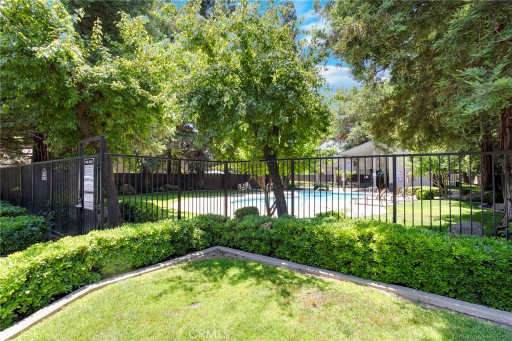 3350 M Street, Unit 24 Merced, CA 95348 - Photo 2 of 38 a view of a backyard with a garden