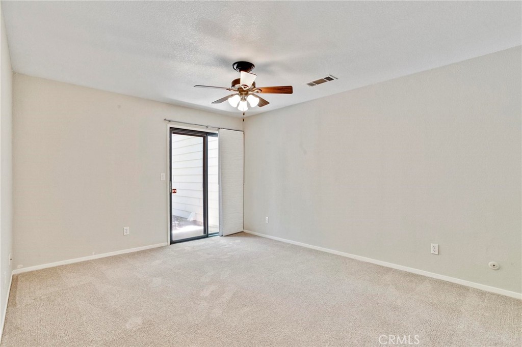 3350 M Street, Unit 24 Merced, CA 95348 - Photo 23 of 38 a view of an empty room with a window