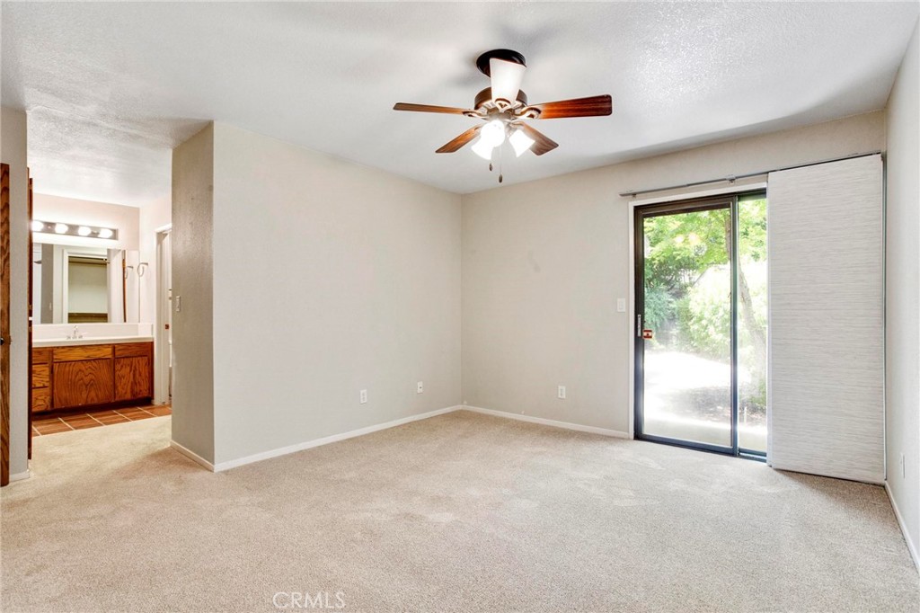 3350 M Street, Unit 24 Merced, CA 95348 - Photo 24 of 38 a view of an empty room with a window