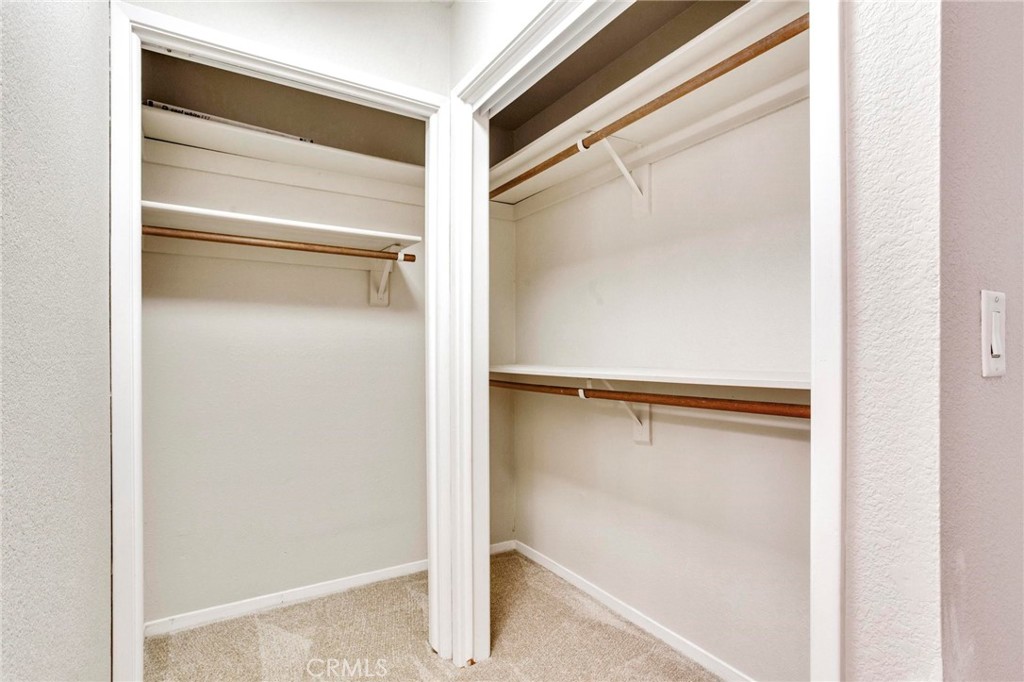 3350 M Street, Unit 24 Merced, CA 95348 - Photo 26 of 38 a bathroom with a glass shower door