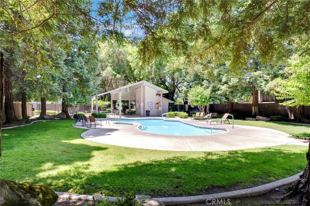 3350 M Street, Unit 24 Merced, CA 95348 - Photo 36 of 38 a view of a swimming pool with a patio