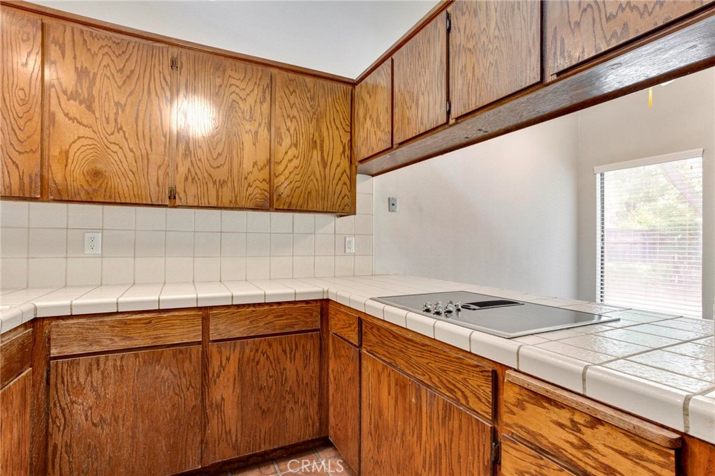 3350 M Street, Unit 24 Merced, CA 95348 - Photo 6 of 38 a kitchen with a sink and cabinets