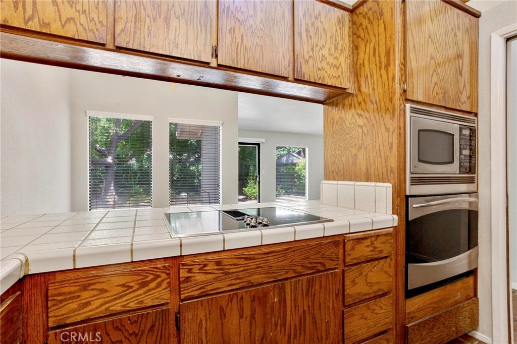 3350 M Street, Unit 24 Merced, CA 95348 - Photo 9 of 38 a kitchen with a sink and a window