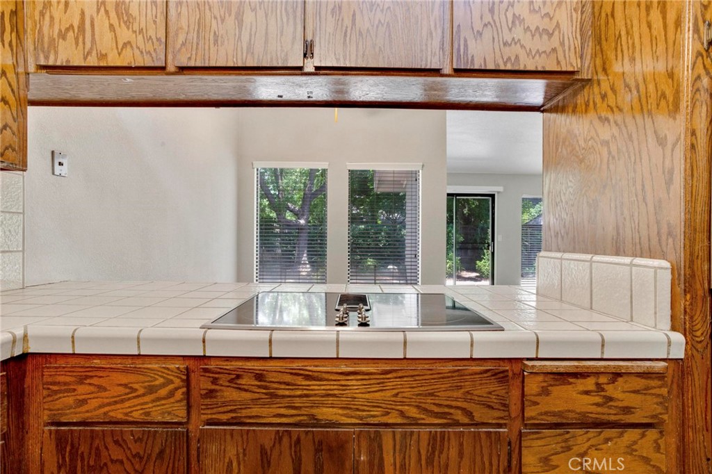 3350 M Street, Unit 24 Merced, CA 95348 - Photo 10 of 38 a living room with a large window and furniture