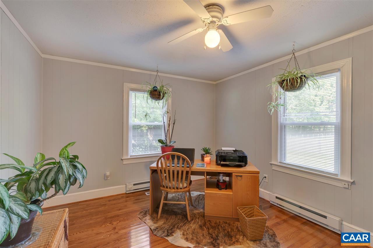 6220 Venable Road Kents Store, VA 23084 - Photo 15 of 50 a dining room with furniture a chandelier and wooden floor