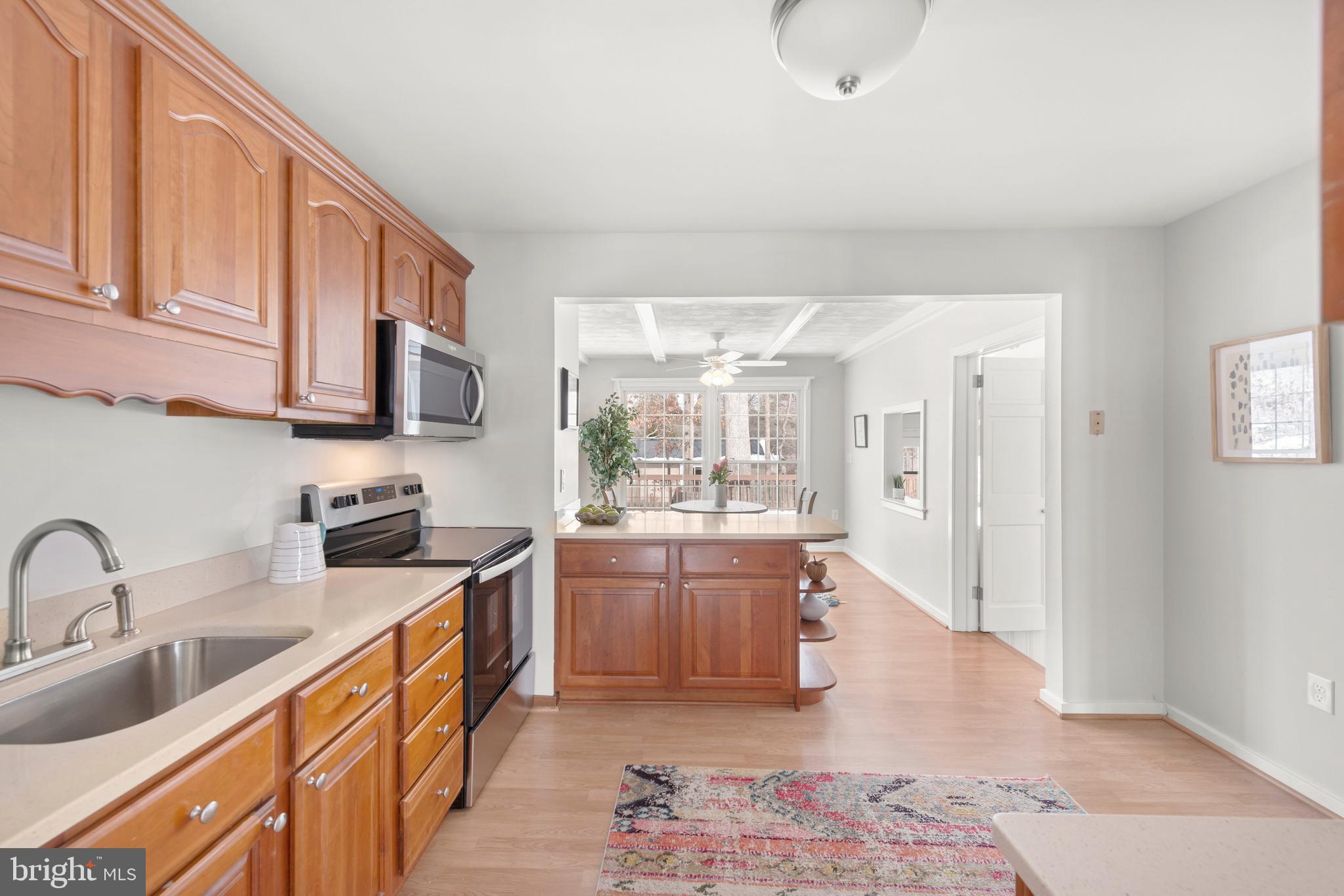 8120 Old Oaks Drive Springfield, VA 22152 - Photo 16 of 57 Opens to breakfast nook overlooking the backyard