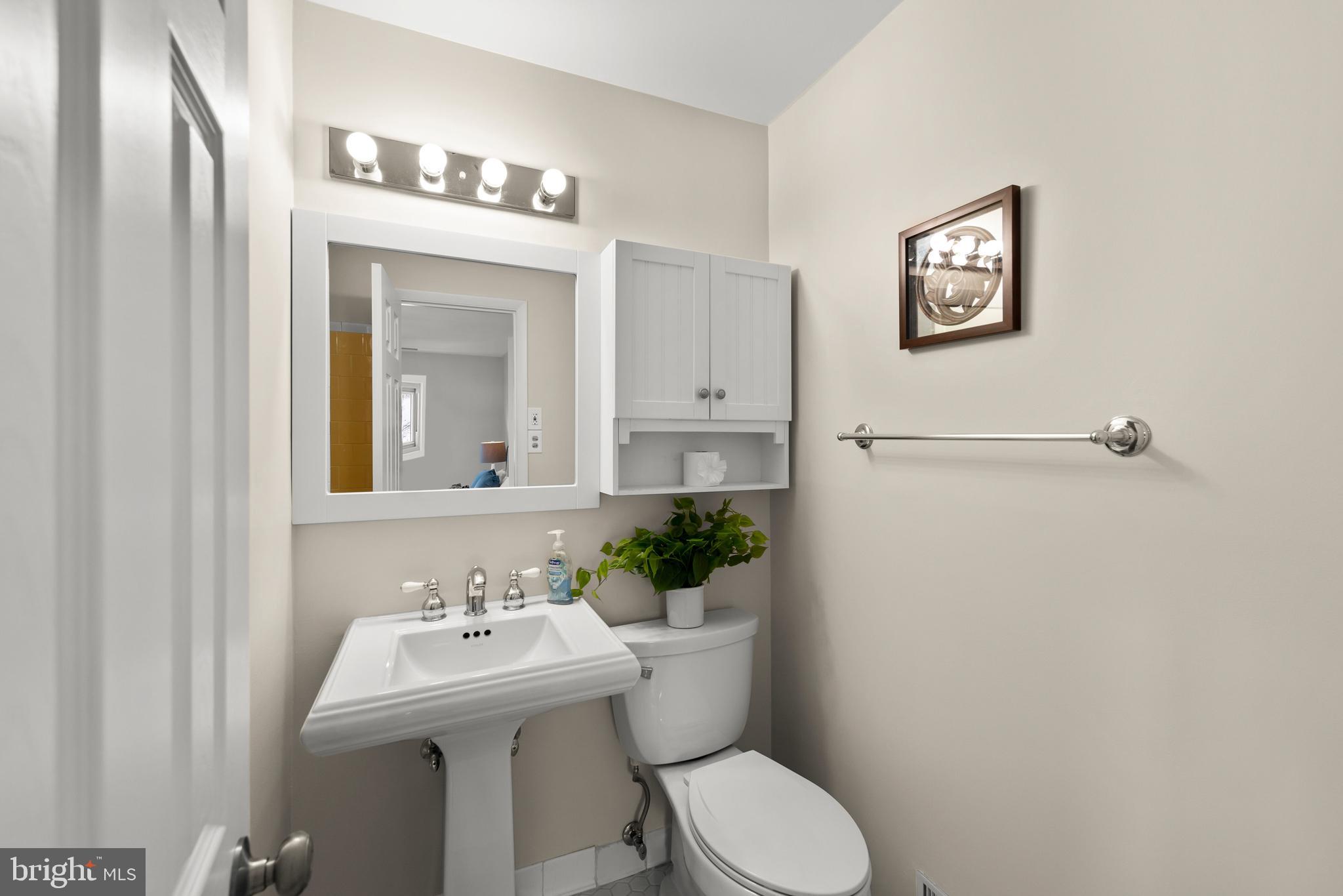 8120 Old Oaks Drive Springfield, VA 22152 - Photo 35 of 57 Ensuite bath with pedestal sink