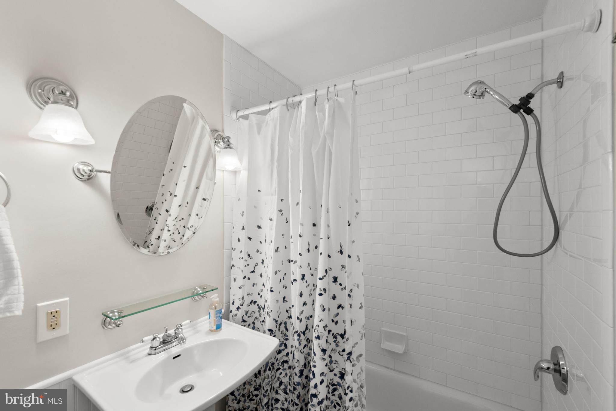 8120 Old Oaks Drive Springfield, VA 22152 - Photo 43 of 57 Hall bathroom updated with subway tile