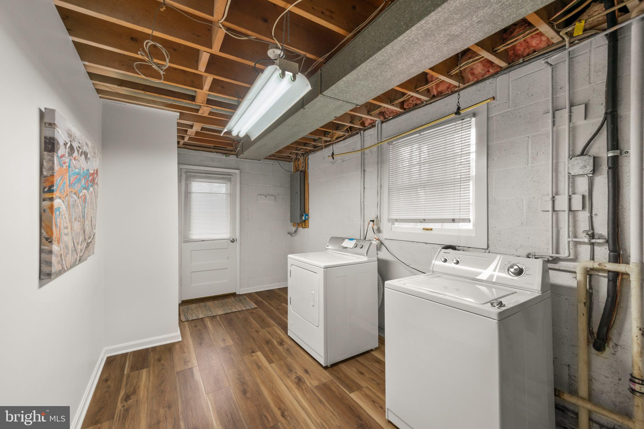 8120 Old Oaks Drive Springfield, VA 22152 - Photo 53 of 57 Laundry and utility access to side, LVP flooring