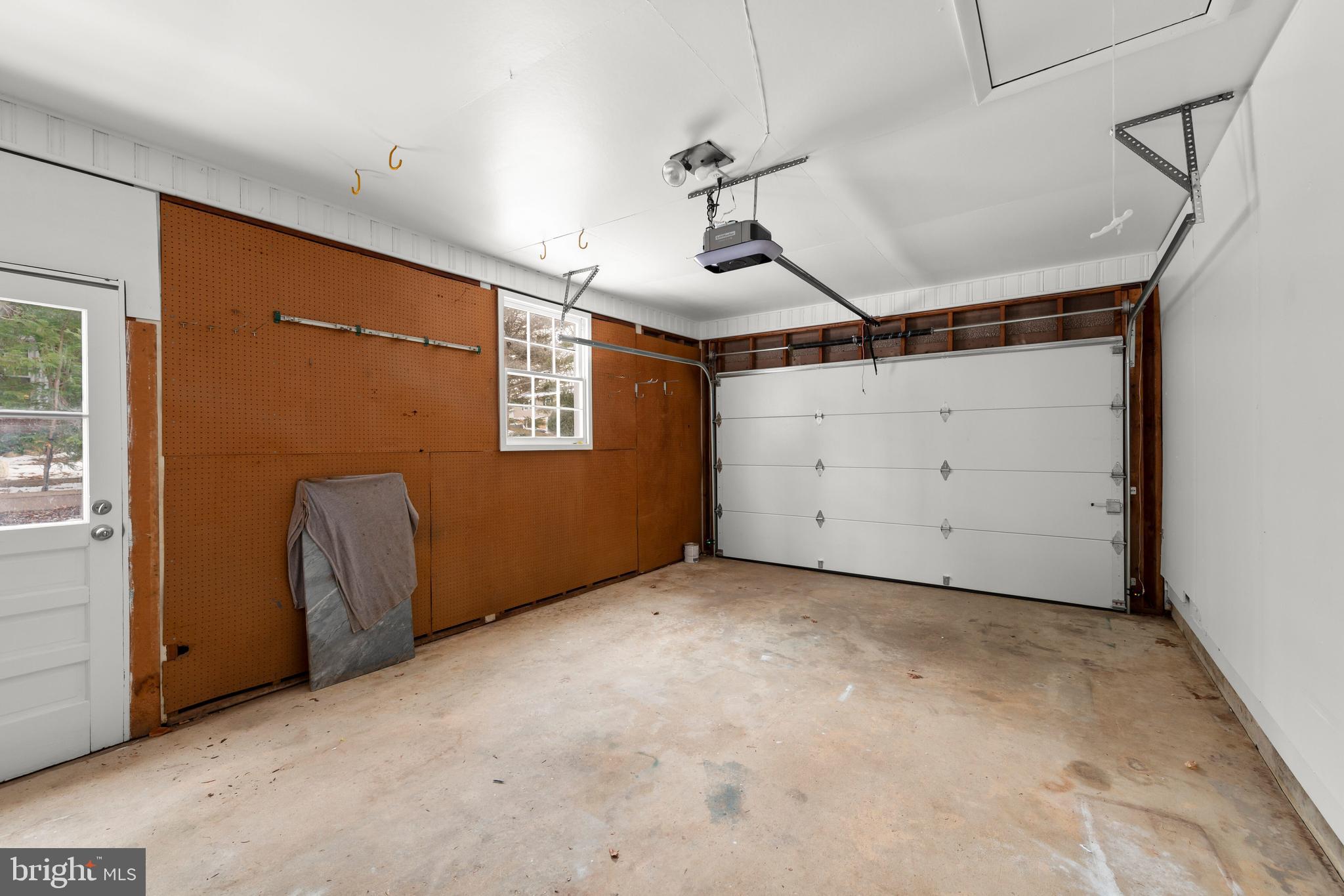8120 Old Oaks Drive Springfield, VA 22152 - Photo 57 of 57 Garage brand new door and opener! Great workspace