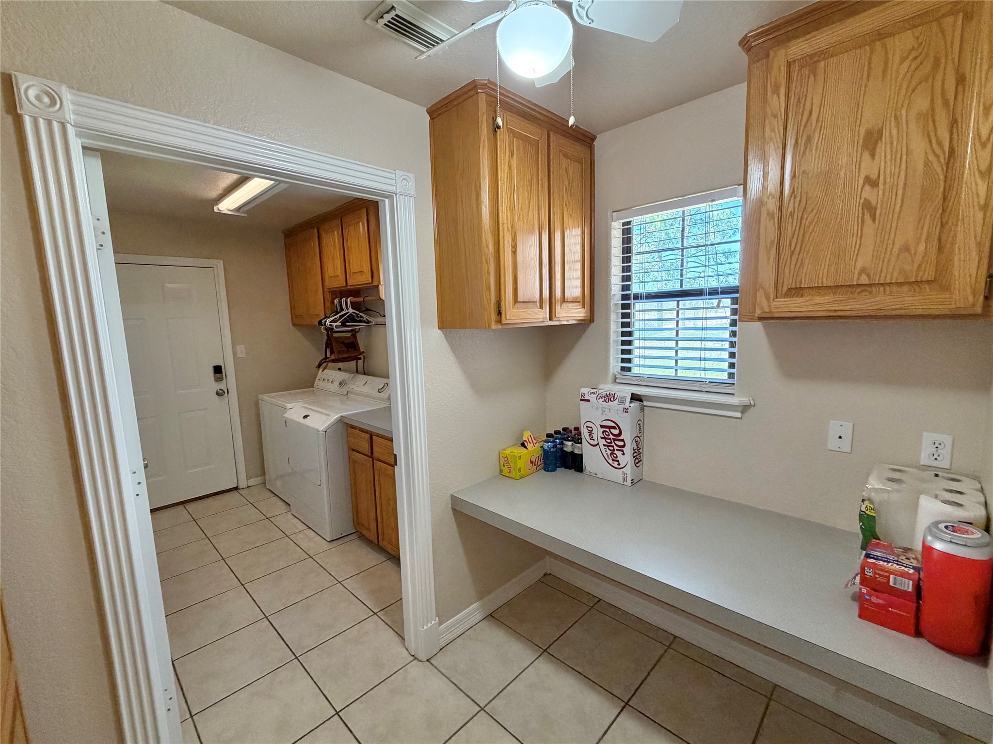 15903 County Road 621 Angleton, TX 77515 - Photo 17 of 33 a kitchen with a refrigerator and a sink