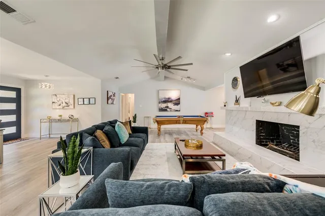 a view of a dining area with furniture window and wooden floor
