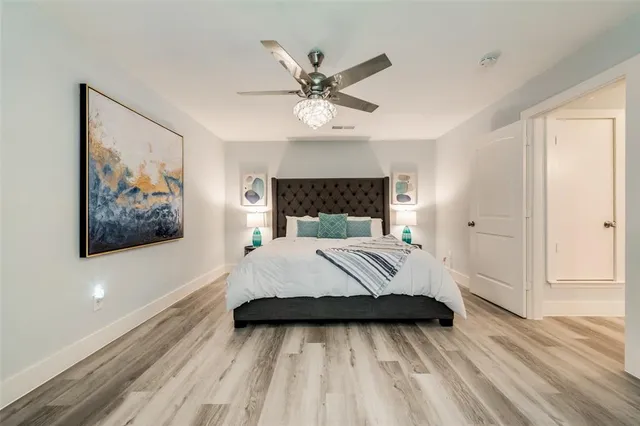 a bathroom with a sink vanity and mirror
