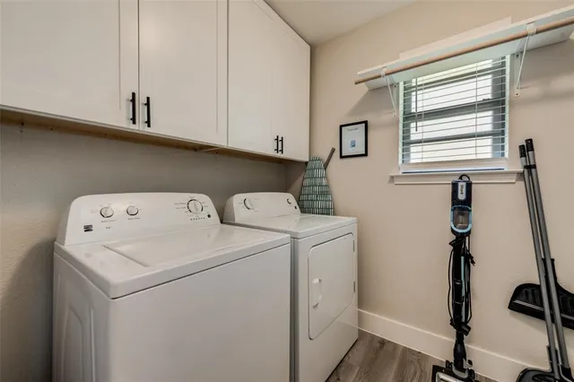 a view of a house with swimming pool and sitting area